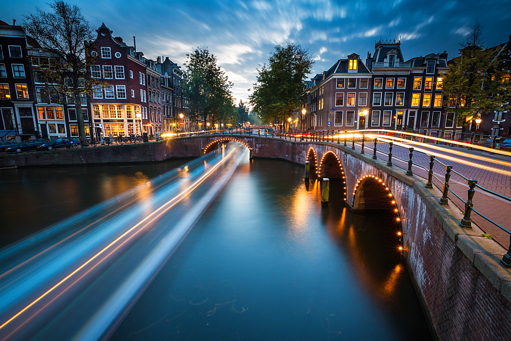 A long exposure of Amsterdam's southern canal rings at the intersection of Leidsegracht and Keizersgracht, Amsterdam, The Netherlands, Europe