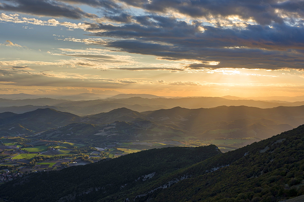 Valley at sunset in autumn, Monte Cucco Park, Apennines, Umbria, Italy, Europe