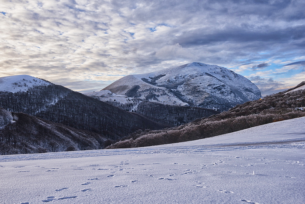 Sunset on Monte Cucco mountain in winter, Apennines, Umbria, Italy, Europe