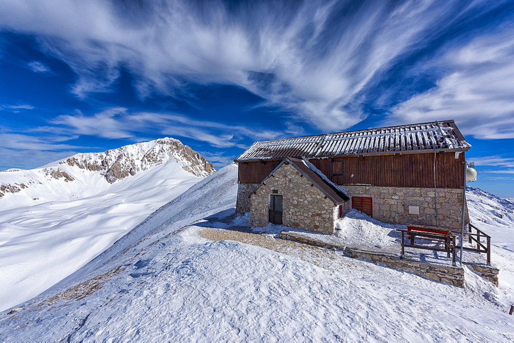 Corno Grande peak and Duca degli Abruzzi mountain hut in winter, Gran Sasso e Monti della Laga, Abruzzo, Apennines, Italy, Europe