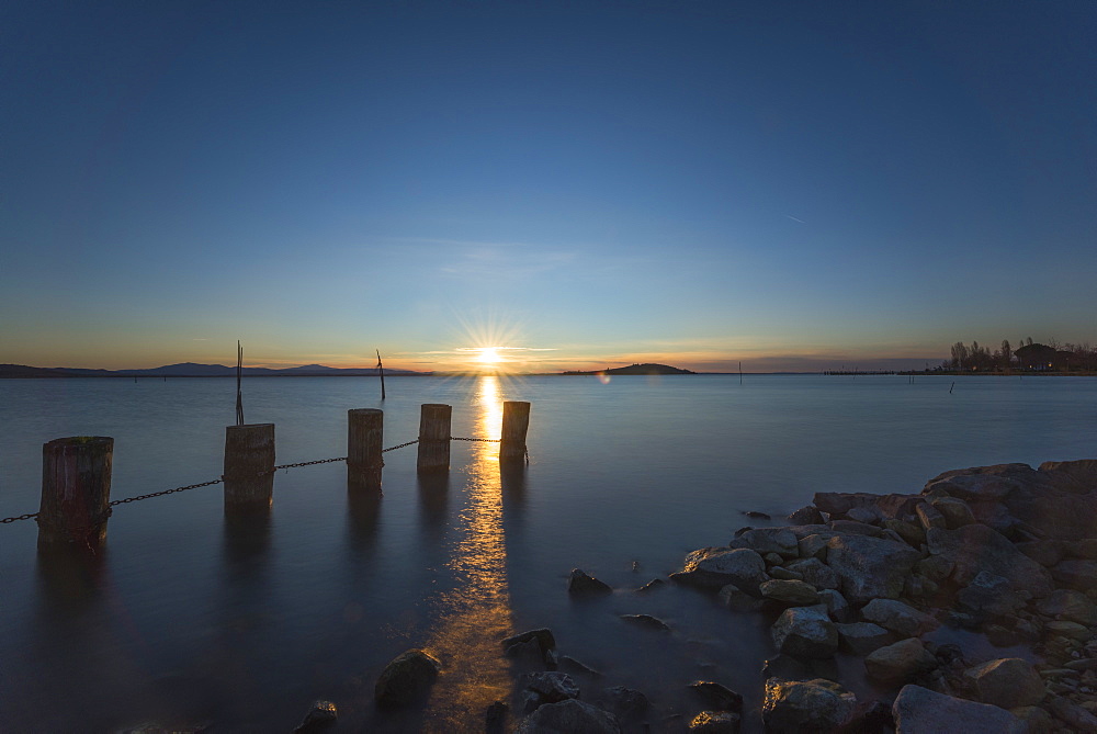 Wooden dock at sunset, Lake Trasimeno, Perugia, Umbria, Italy, Europe