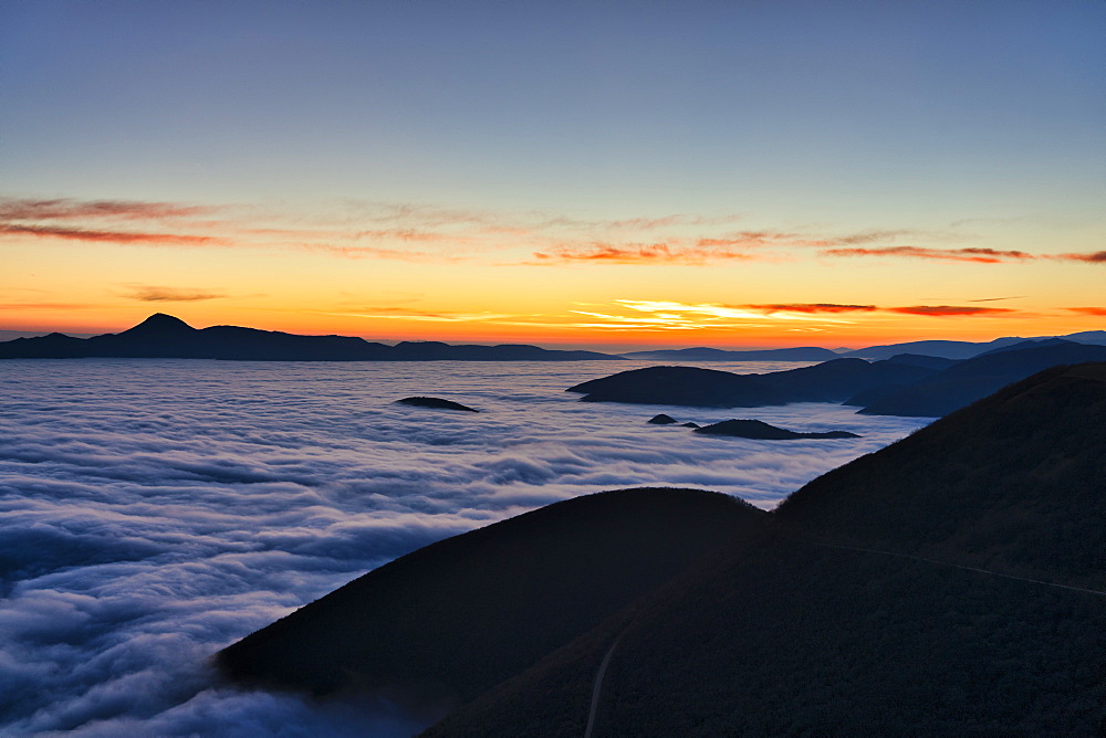 Mount San Vicino at dusk seen from Mount Cucco, Apennines, Marche, Italy, Europe