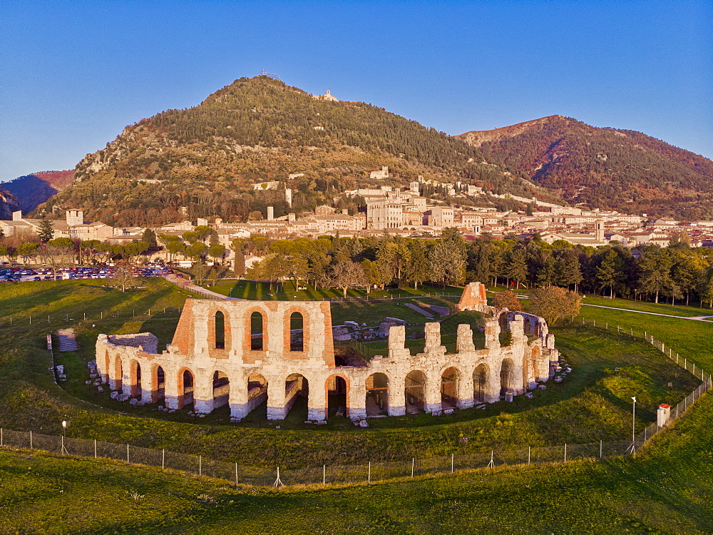 The town and the Roman Theater at sunset, Gubbio, Umbria, Italy, Europe