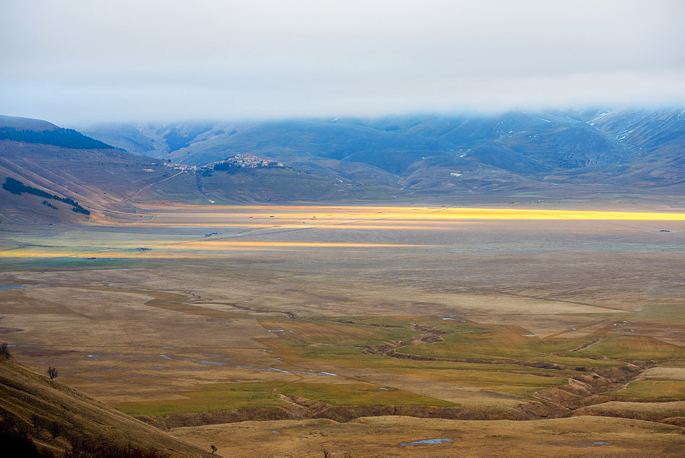 Plateau Piano Grande di Castelluccio di Norcia at sunrise, Sibillini Mountains, Umbria, Italy, Europe