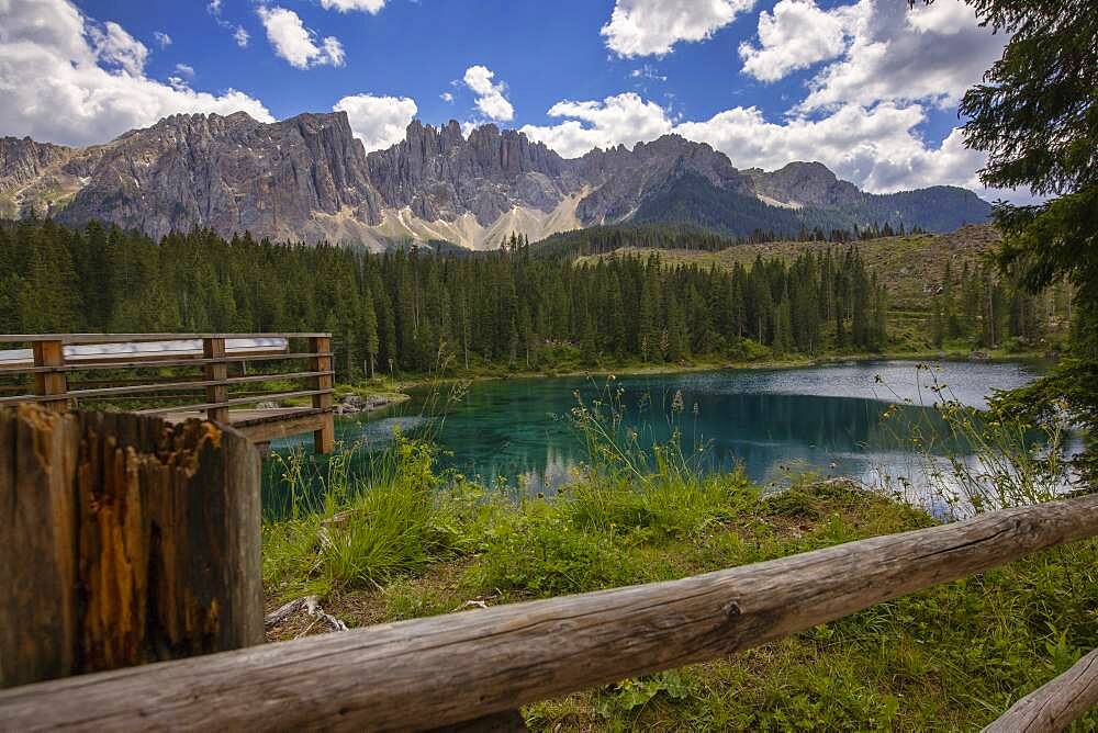 Latemar mountain range reflected in Lake Carezza (Karersee) in summer, South Tyrol, Dolomites, Italy, Europe