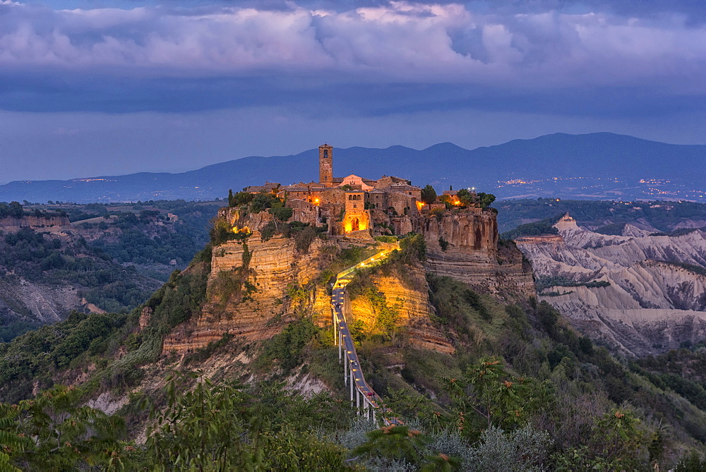 Civita di Bagnoregio and surrounding badlands just after sunset, Lazio, Italy, Europe