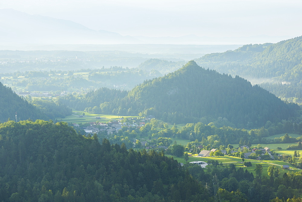 Mountains in the fog at sunrise, Bled, Slovenia, Europe