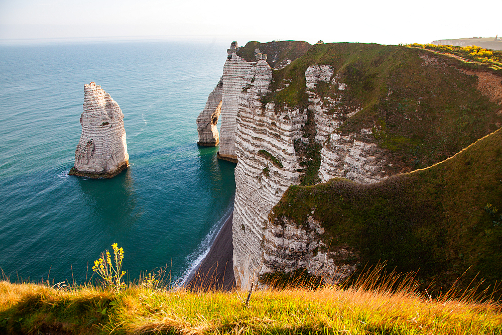 Falaise d'Aval, the famous white cliffs of Etretat village, Normandy, France, Europe