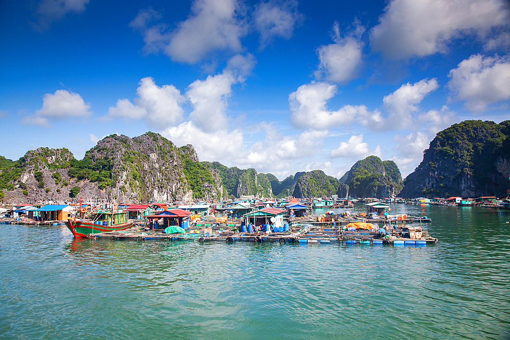 Ha Long Bay from Cat Ba island, Ha Long city in the background, UNESCO World Heritage Site, Vietnam, Indochina, Southeast Asia, Asia