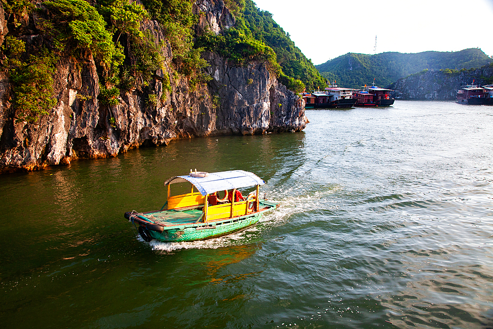 Ha Long Bay from Cat Ba island, Ha Long city in the background, UNESCO World Heritage Site, Vietnam, Indochina, Southeast Asia, Asia