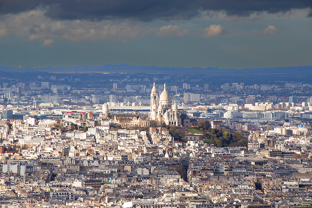 Aerial view over city including Basilique du Sacre-Coeur, Paris, France