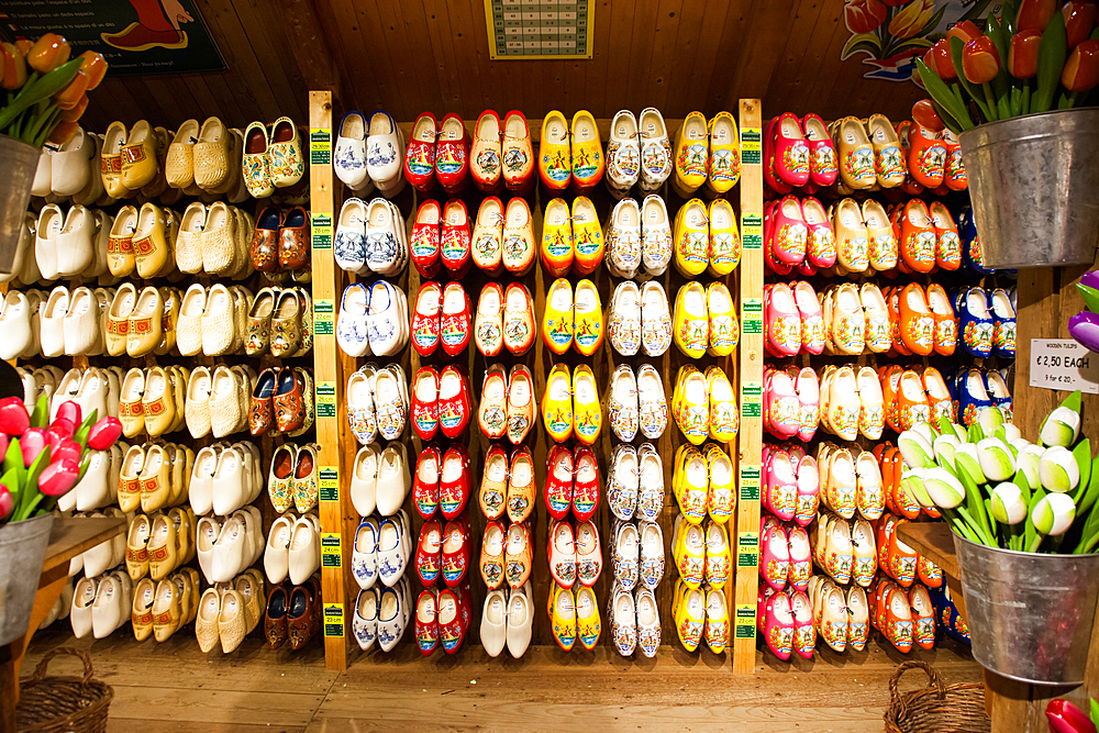 Bright yellow wooden clog, traditional Dutch shoes