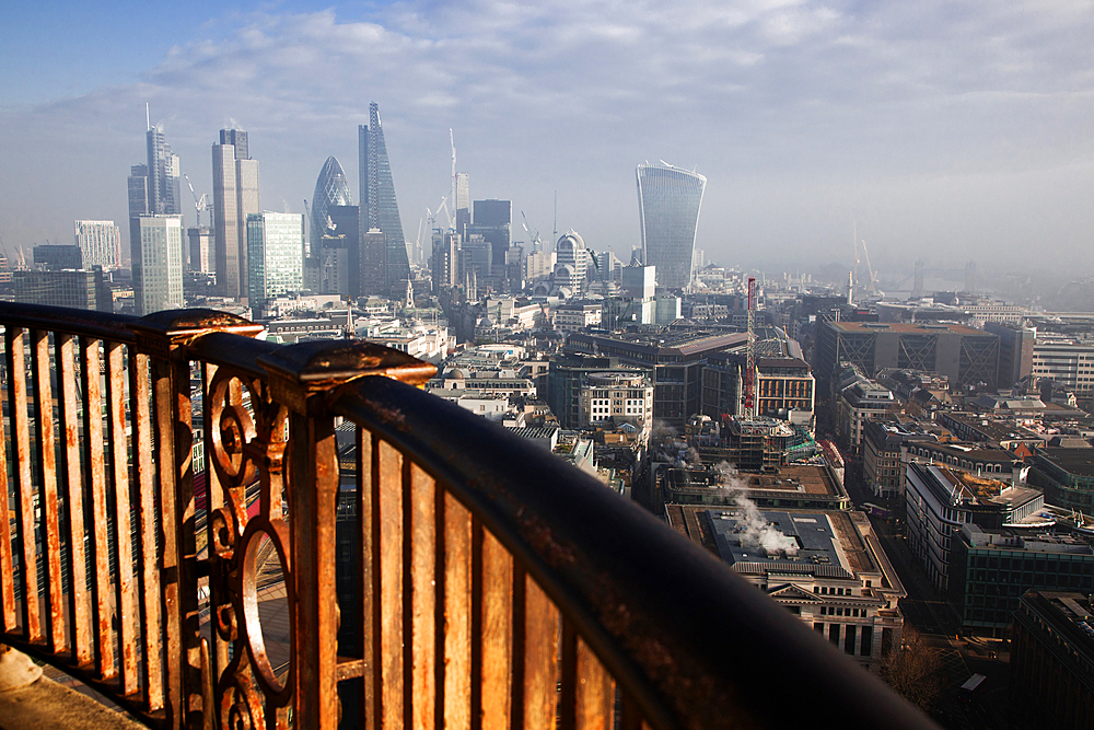 rooftop view over London on a foggy day from St Paul's cathedral, UK