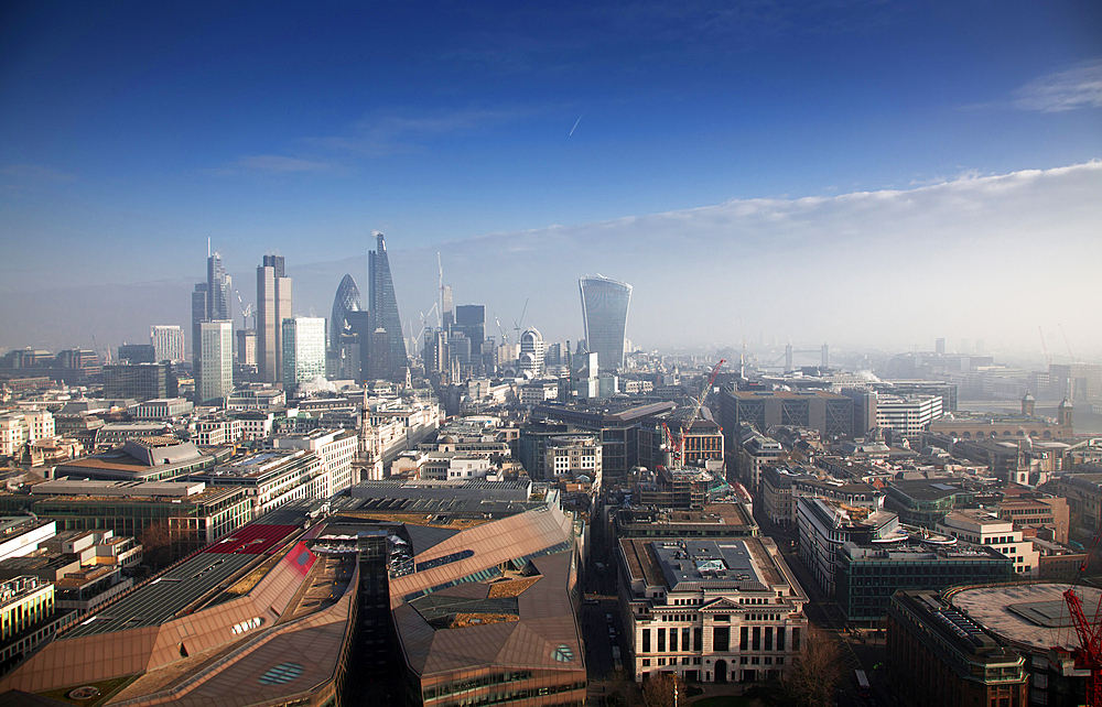 rooftop view over London on a foggy day from St Paul's cathedral, UK