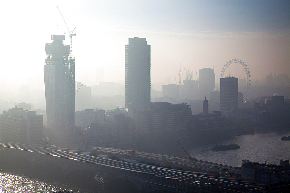 rooftop view over London on a foggy day from St Paul's cathedral, UK