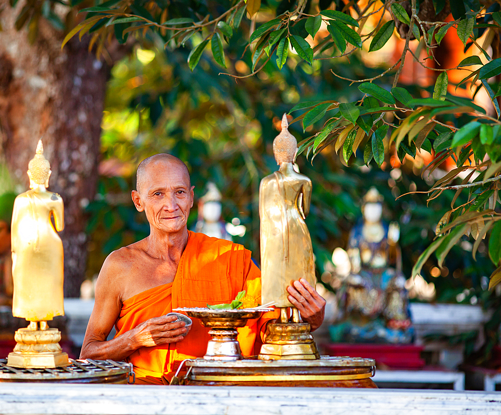 CHIANG MAI THAILAND- FEBRUARY, 2019 : Buddhist monk performing daily duties in Chiangmai,Thailand