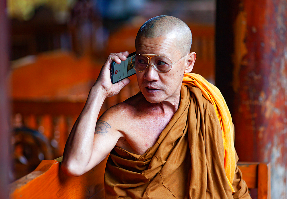 CHIANG MAI THAILAND- FEBRUARY, 2019 : Buddhist monk performing daily duties in Chiangmai,Thailand