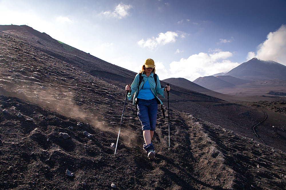 hiker trekking on mount Etna