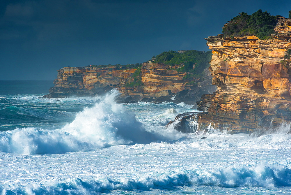 Stormy sea and sky off the coastal walk between Bondi and Tamarama beaches, Sydney, New South Wales, Australia, Pacific