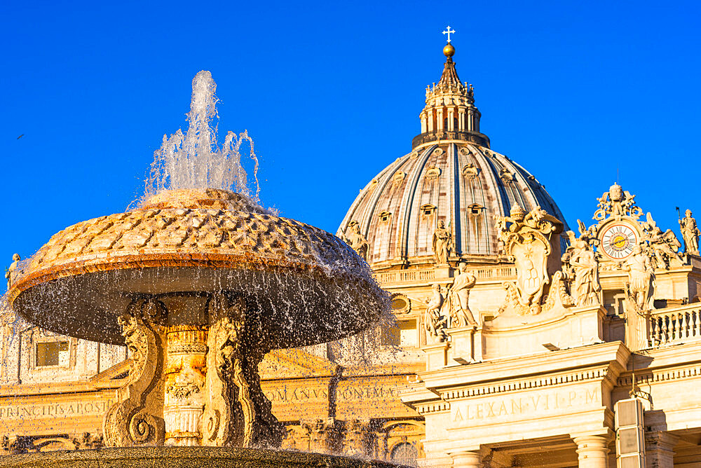 St. Peter's Basilica Cupola and fountain in early morning light, Vatican City, UNESCO World Heritage Site, Rome, Lazio, Italy, Europe