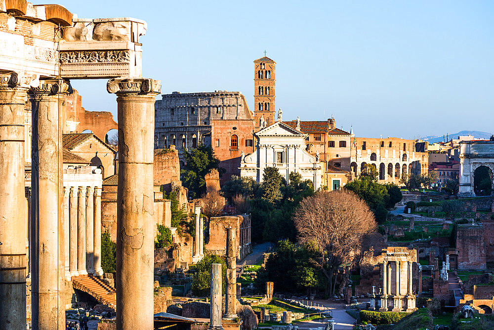 Ancient Roman cityscape at Roman Forum with Basilica of Maxentius and the Coloseum, UNESCO World Heritage Site, Rome, Lazio, Italy, Europe