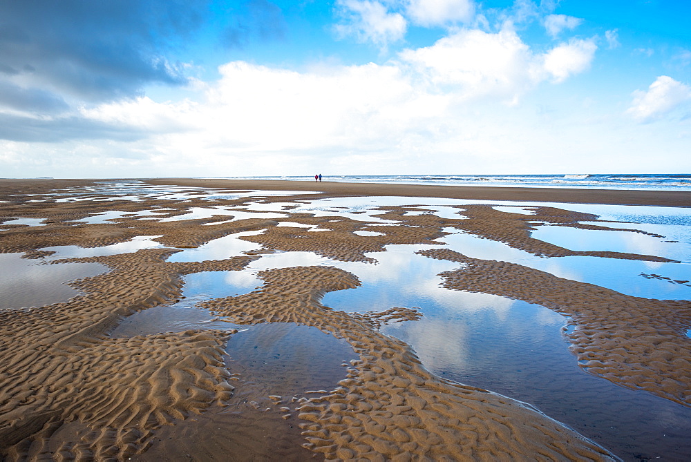 Pools of water making patterns on the beach at Holkham Bay, North Norfolk coast, Norfolk, East Anglia, England, United Kingdom, Europe