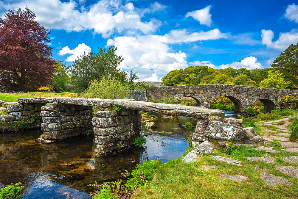 Medieval clapper bridge over the East Dart River at Postbridge on Dartmoor in Devon, England, United Kingdom, Europe