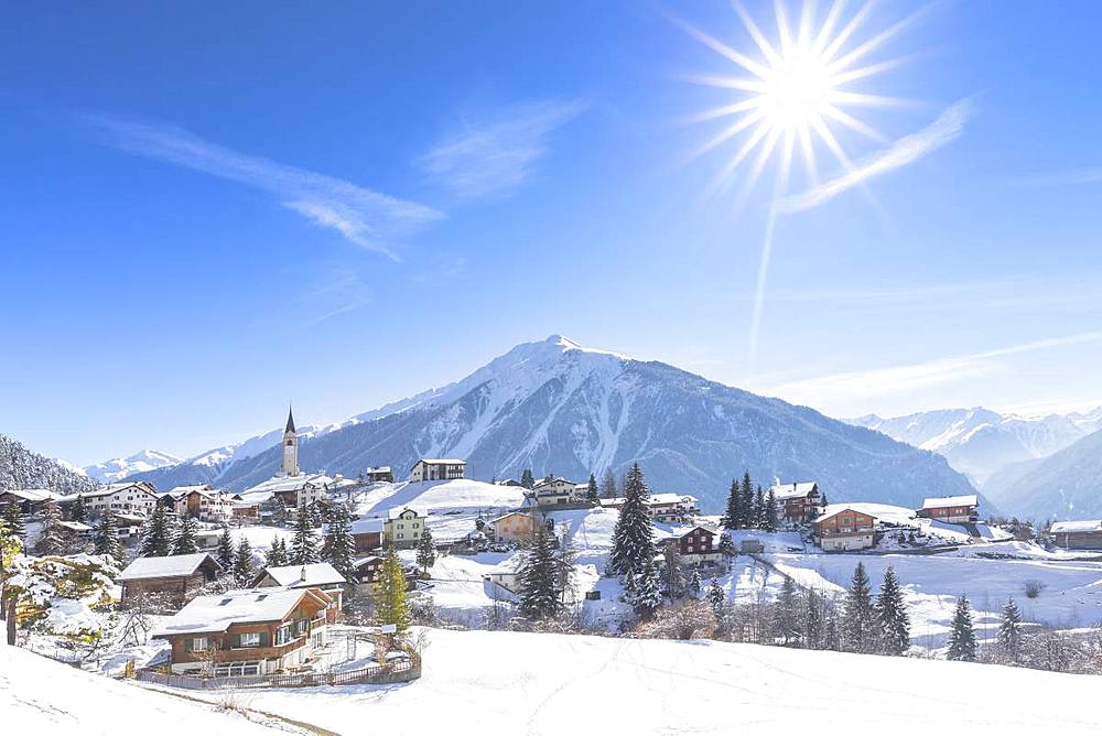 The sun shines on Davos Wiesen, Albula Valley, District of Prattigau/Davos, Canton of Graubunden, Switzerland, Europe