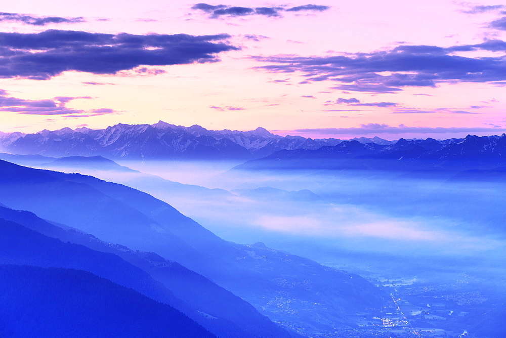 Fog in the valley during sunrise, Valtellina, Lombardy, Italy, Europe