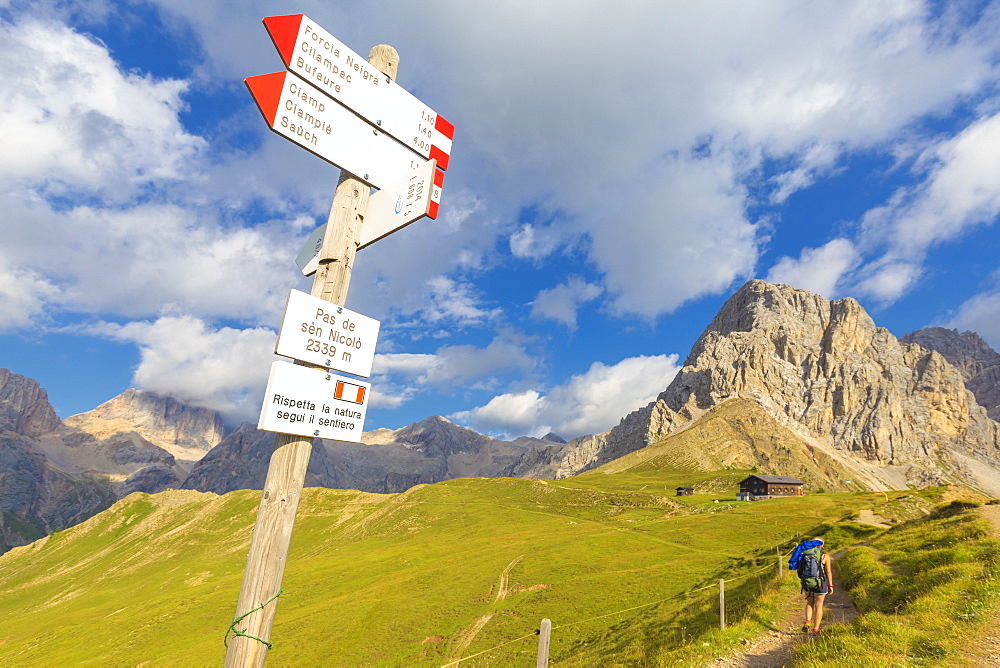 Hiking signs at San Nicolo Pass, Fassa Valley, Trentino, Dolomites, Italy, Europe