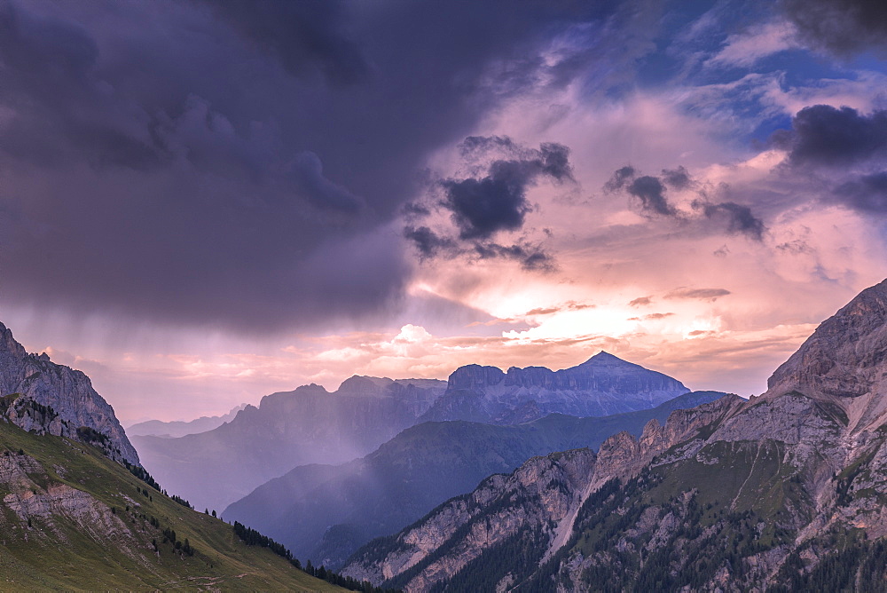 Thunderstorm during sunset on Sella Group, Fassa Valley, Trentino, Dolomites, Italy, Europe