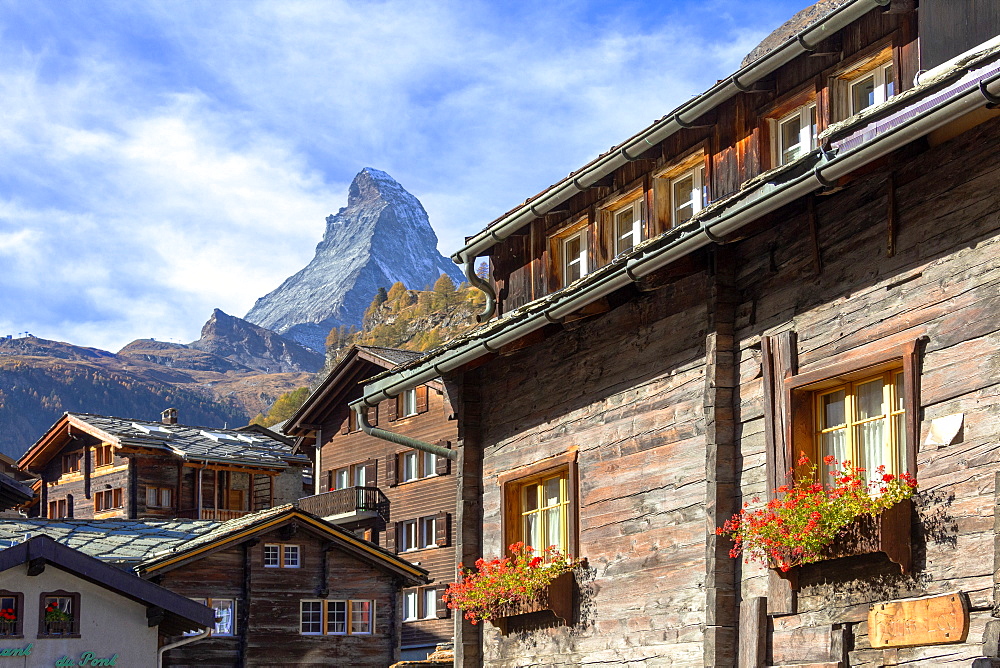 Wooden houses below Matterhorn in Zermatt, Switzerland, Europe