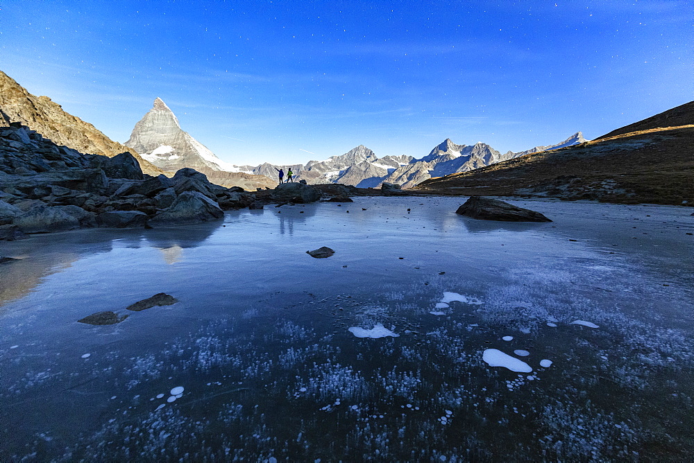 Frozen Riffelsee lake by Matterhorn in Switzerland, Europe