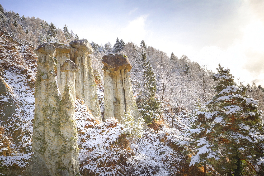 Hoodoos of Postalesio after a snowfall, Postalesio, Valtellina, Lombardy, Italy, Europe