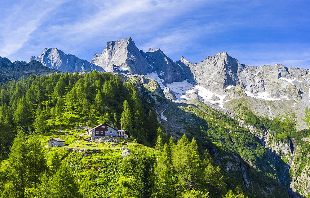 Sasc Fura hut with the famous Pizzo Badile in the background, Bondasca valley, Bregaglia valley, Graubunden, Switzerland, Europe