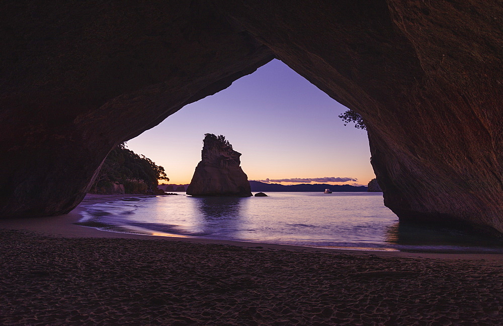 Cathedral Cove at sunset. Coromandel Peninsula, North Island, New Zealand, Pacific