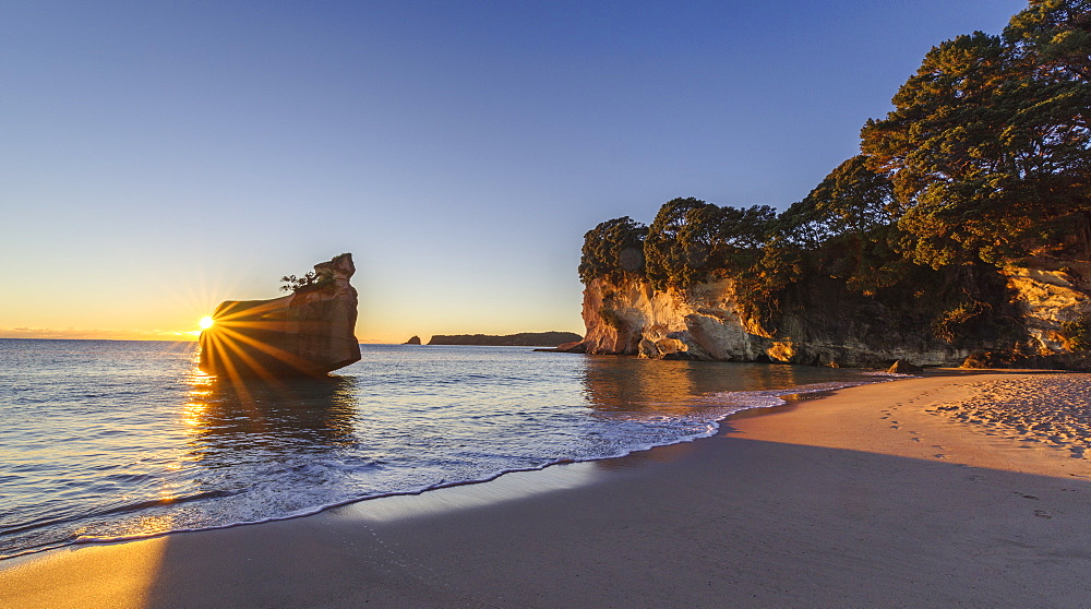 Sunrise at the Cathedral Cove, Te Whanganui-A-Hei Marine Reserve, Coromandel Peninsula, North Island, New Zealand, Pacific