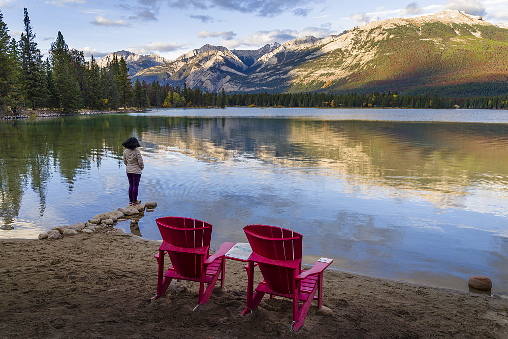 Tourist and Red Chairs by Lake Edith, Jasper National Park, UNESCO World Heritage Site, Canadian Rockies, Alberta, Canada, North America