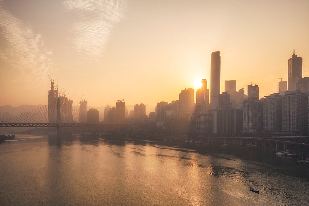 Chongqing city skyline at dawn, with the view of the Yuzhong peninsula CBD and Jialing River, Chongqing, China, Asia