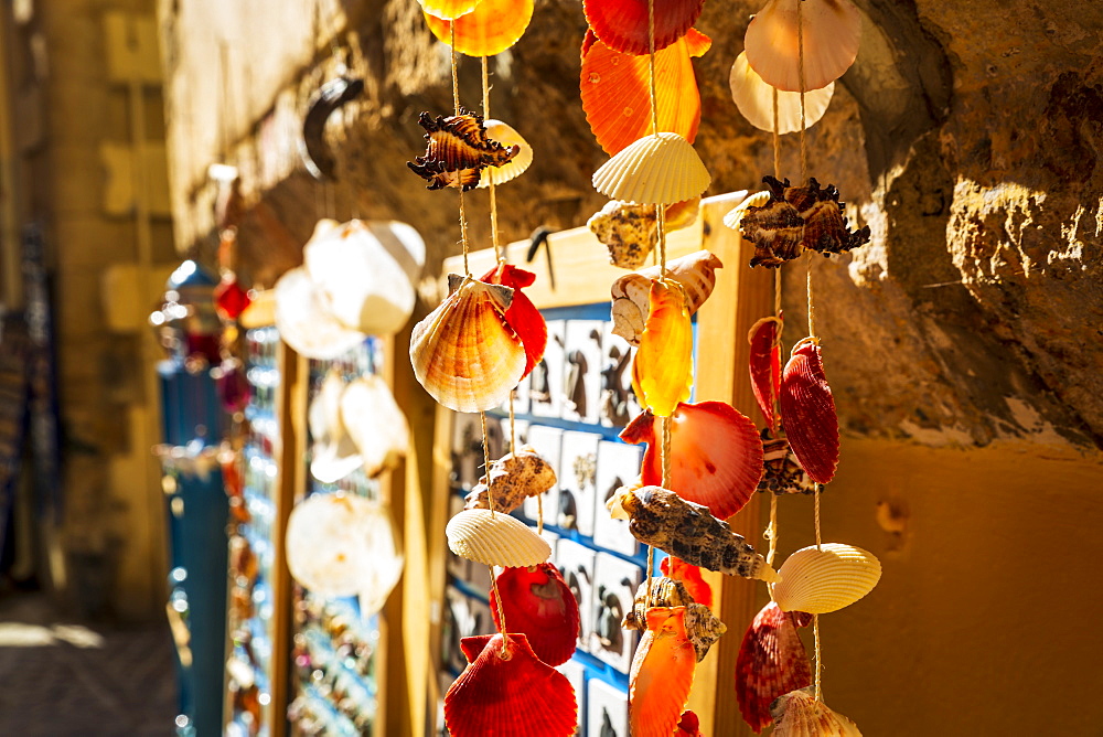 Colourful souvenirs and sea shells for sale in Crete, Greek Islands, Greece, Europe