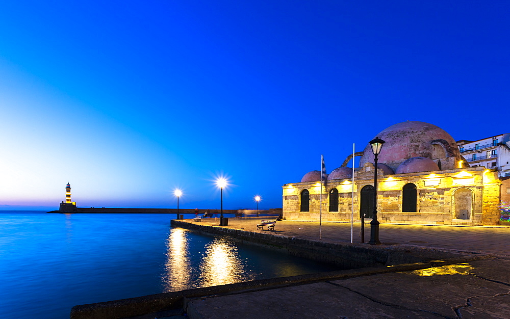 Lighthouse at Venetian port and Turkish Mosque Hassan Pasha at night, Chania, Crete, Greek Islands, Greece, Europe