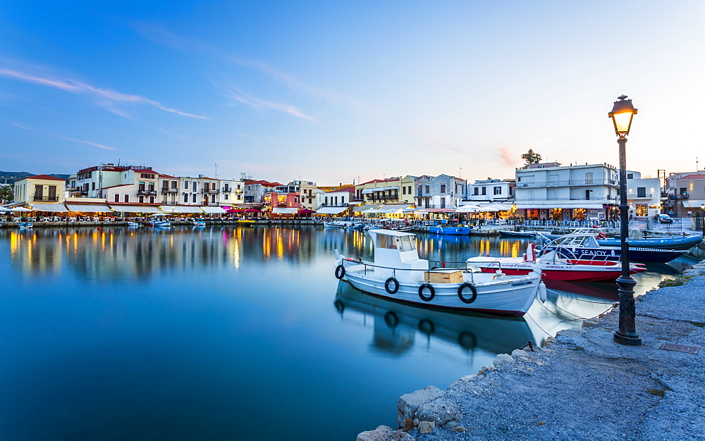 Old Venetian harbour, taverns on seaside at dusk, Rethymno (Rethymnon), Crete, Greek Islands, Greece, Europe