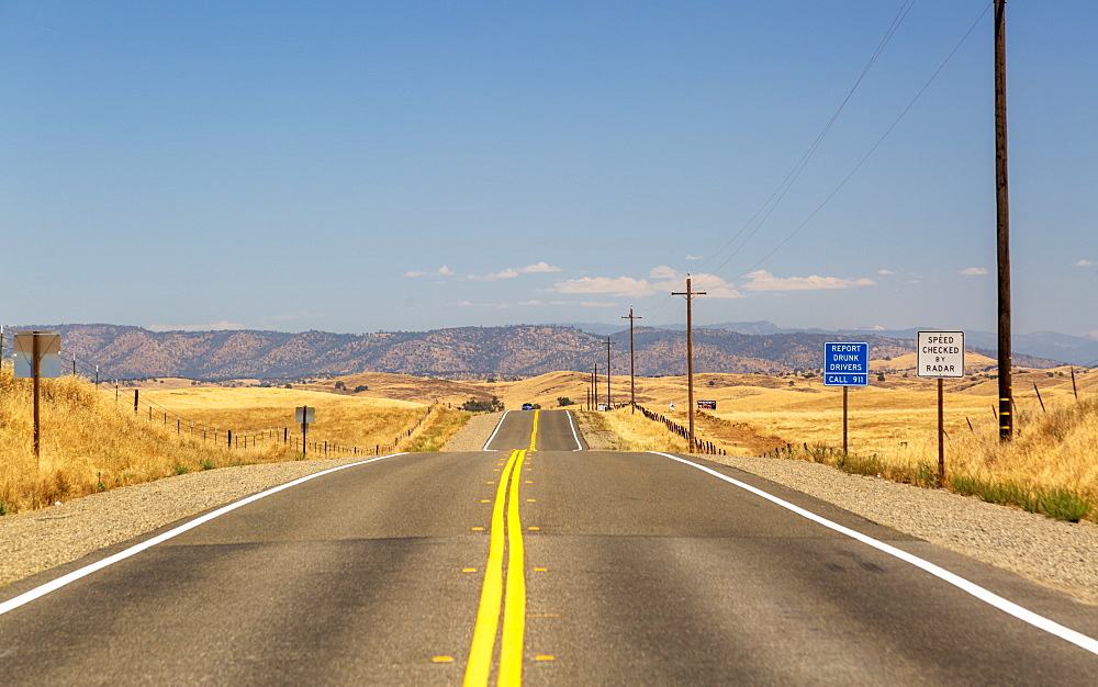 Highway and electricity poles, California, United States of America, North America