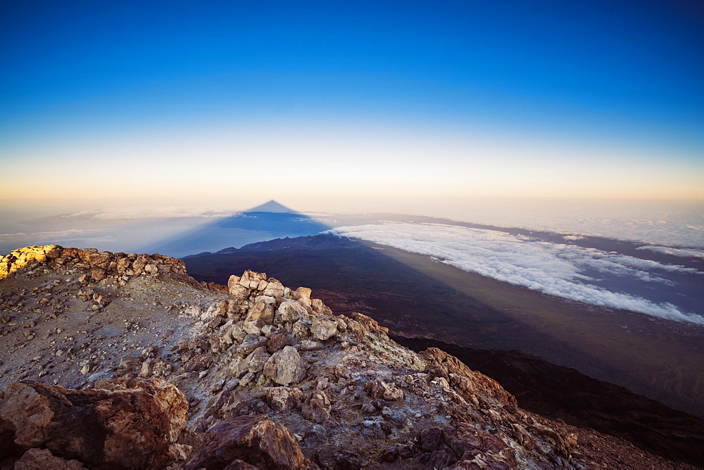 View of El Teide Volcano shadow from the summit at sunrise, El Teide National Park, UNESCO World Heritage Site, Tenerife, Canary Islands, Spain, Atlantic, Europe