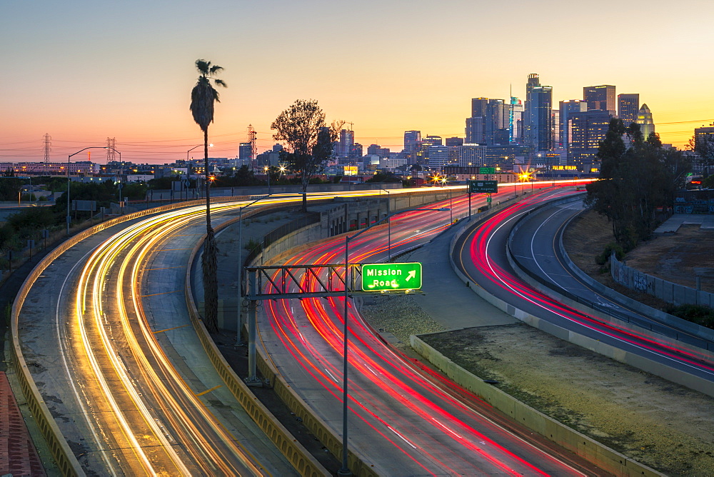 View of Downtown skyline and Mission Road at night, Los Angeles, California, United States of America, North America