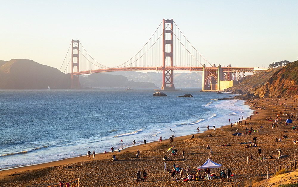 Sun sets near the Golden Gate Bridge, Baker Beach, San Francisco, California, United States of America, North America