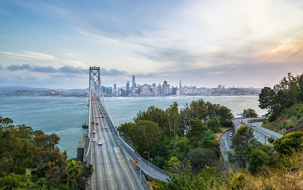 View of San Francisco skyline and Oakland Bay Bridge from Treasure Island at sunset, San Francisco, California, United States of America, North America