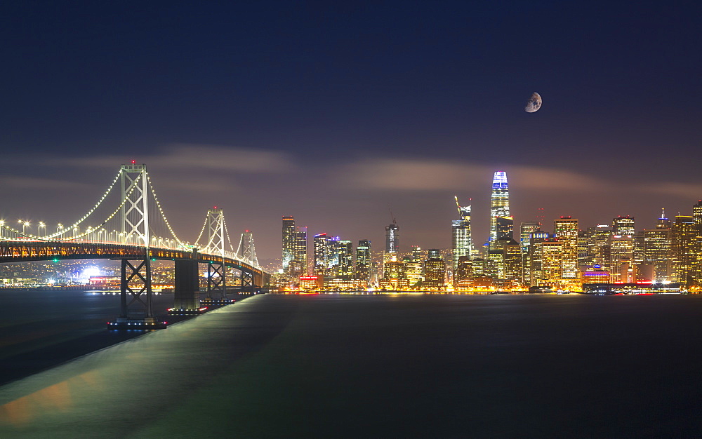 View of San Francisco skyline and Oakland Bay Bridge from Treasure Island at night, San Francisco, California, United States of America, North America