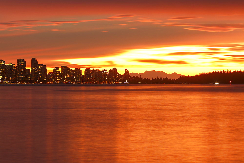 View of Vancouver skyline from North Vancouver at sunset, British Columbia, Canada, North America