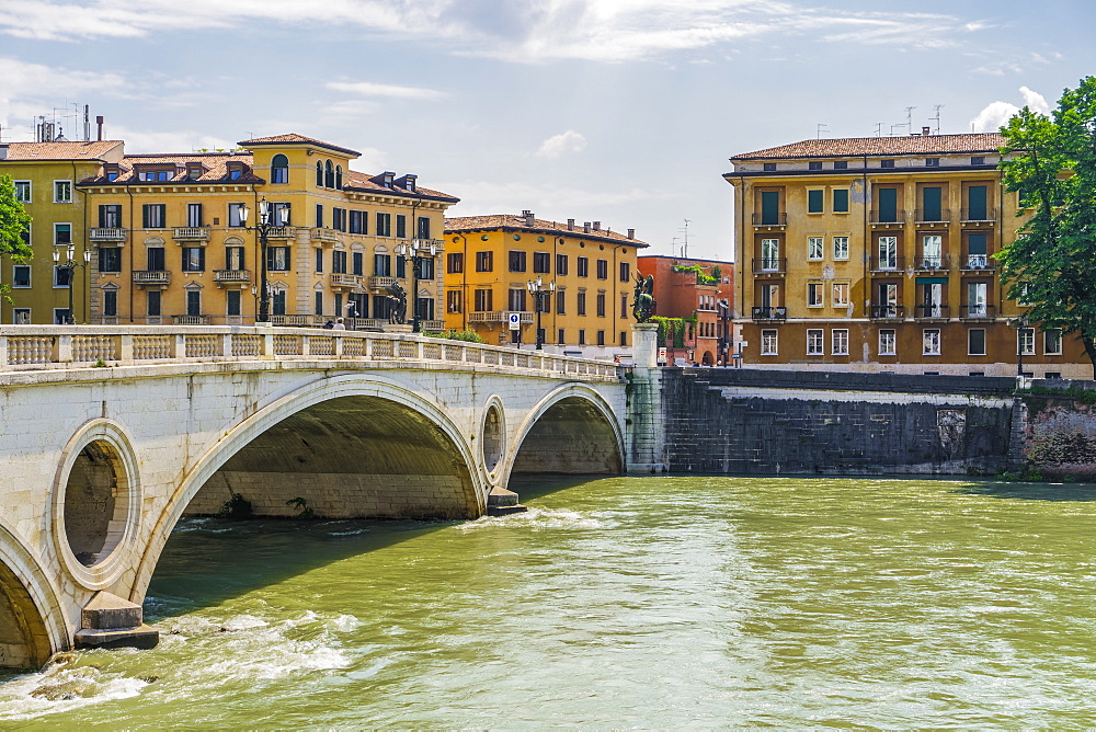 View of Victory Bridge with background buildings on River Adige, Verona, Veneto, Italy, Europe